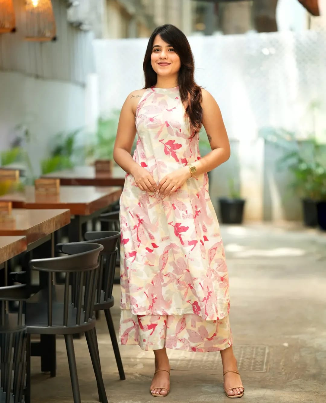 pink floral printed Kurta Palazzo set and sleeveless halter neck design