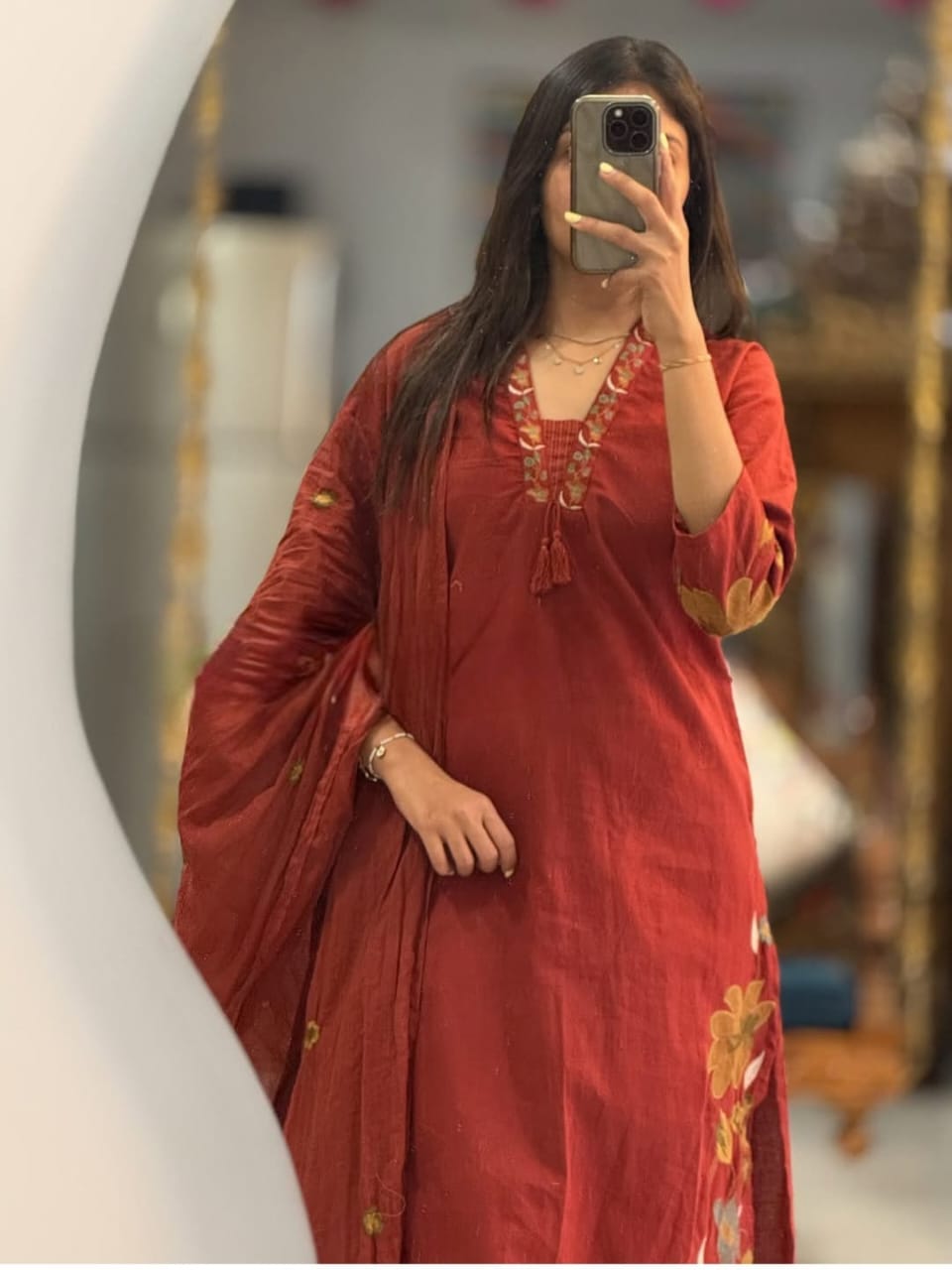 maroon women's straight kurta set featuring floral embroidery