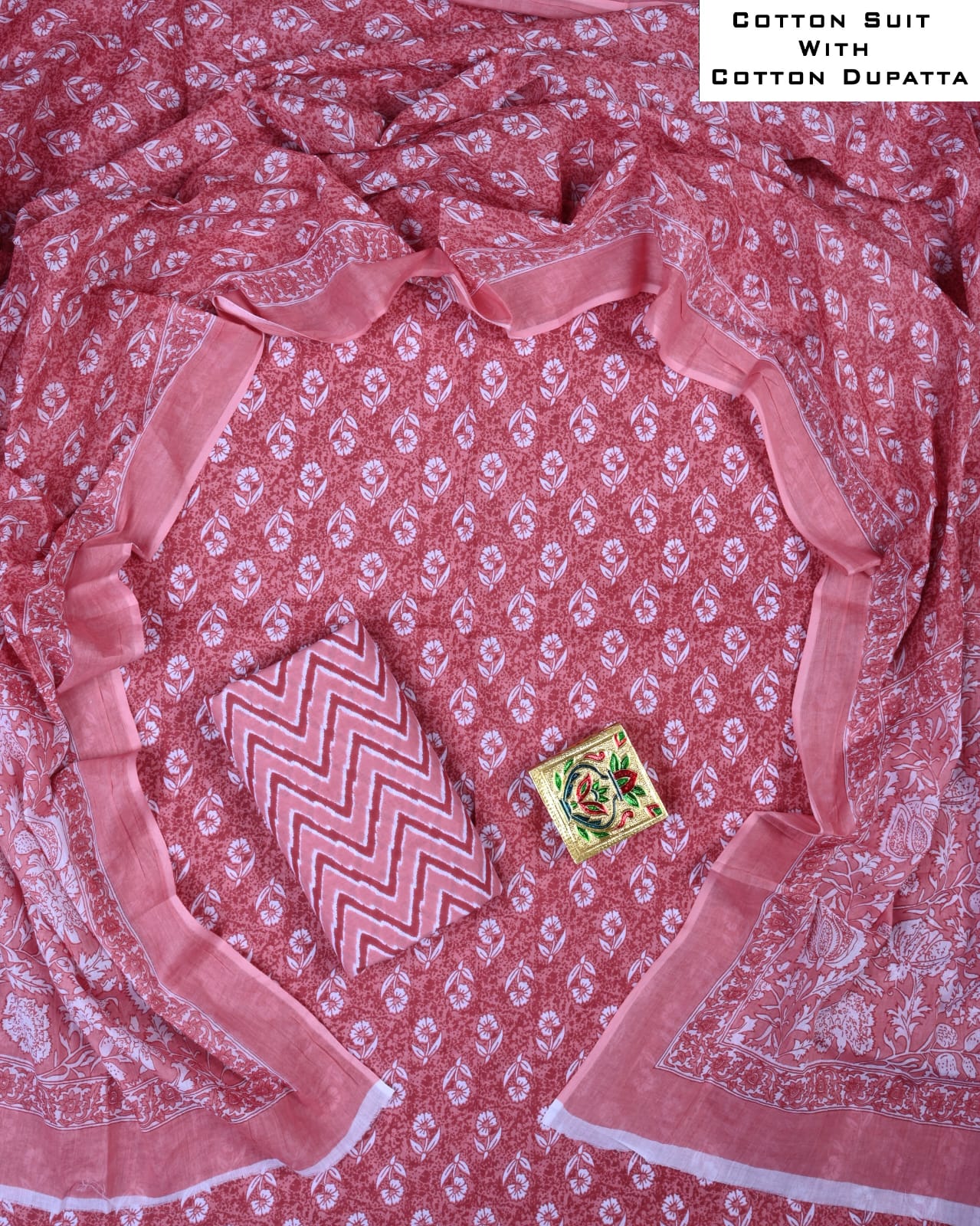 Cotton suit with dupatta on a pink background
