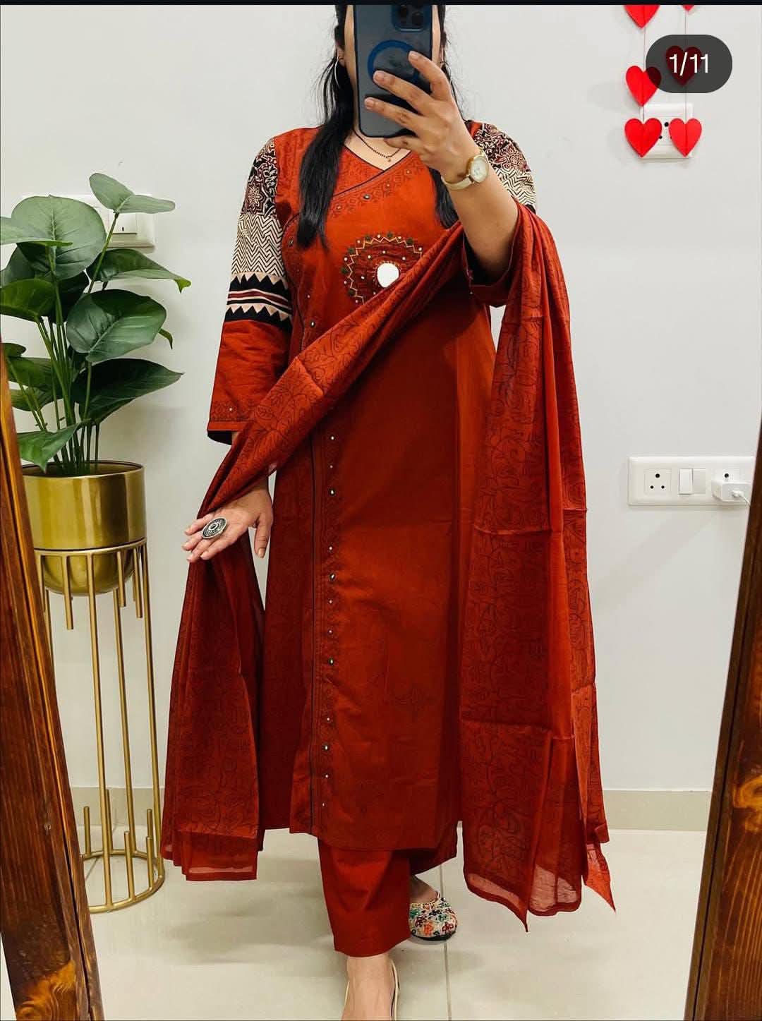 rust-colored Dhabu cotton Angrakha style suit