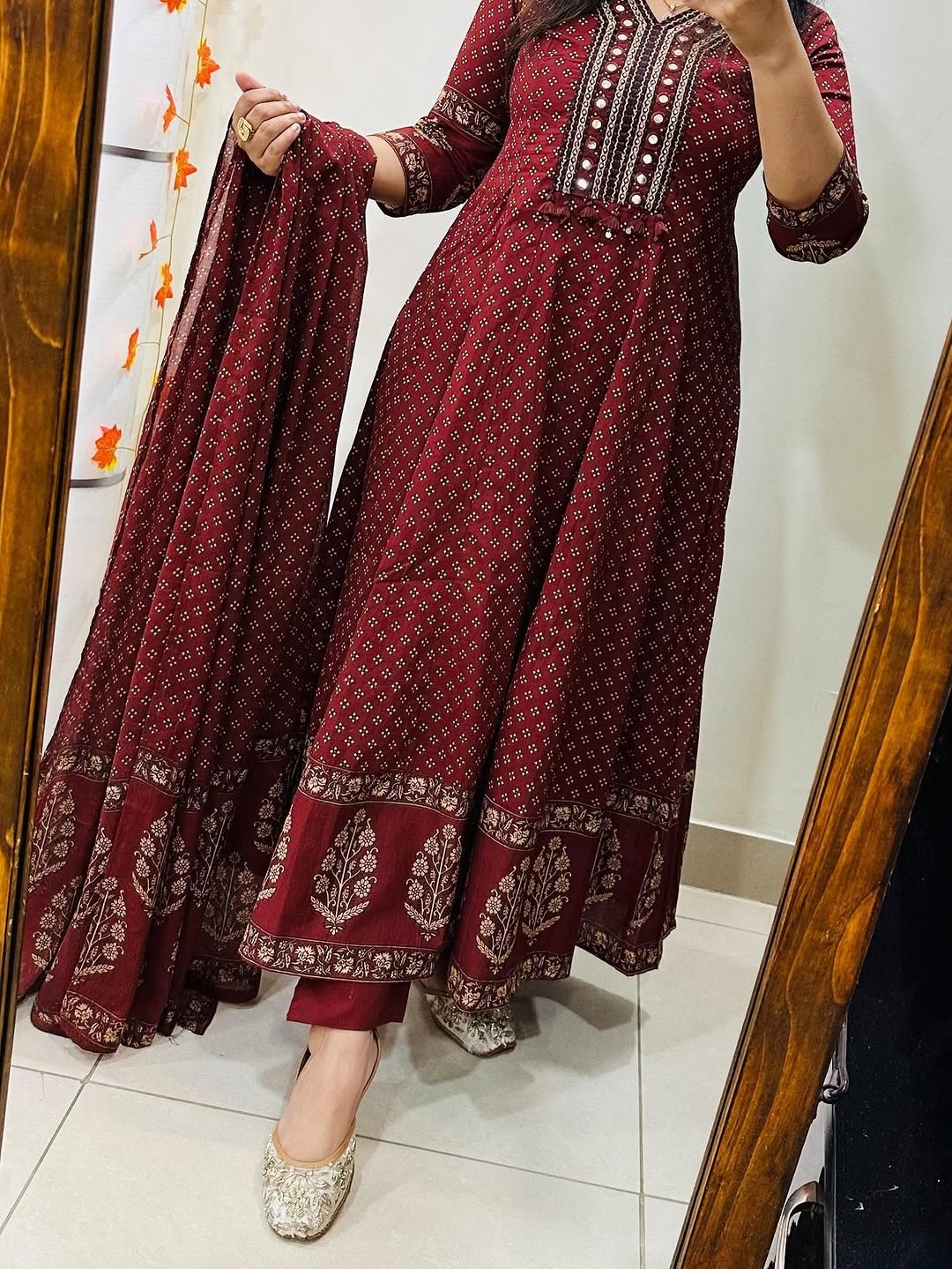 maroon rayon printed Anarkali kurta set with a matching dupatta