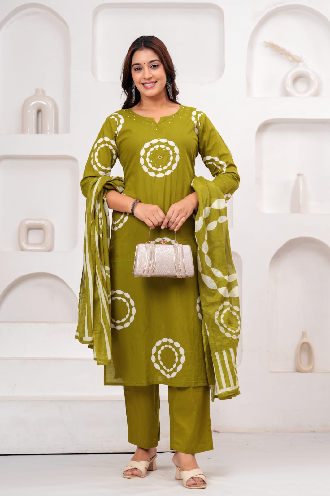 olive green cotton kurta set features white circular patterns