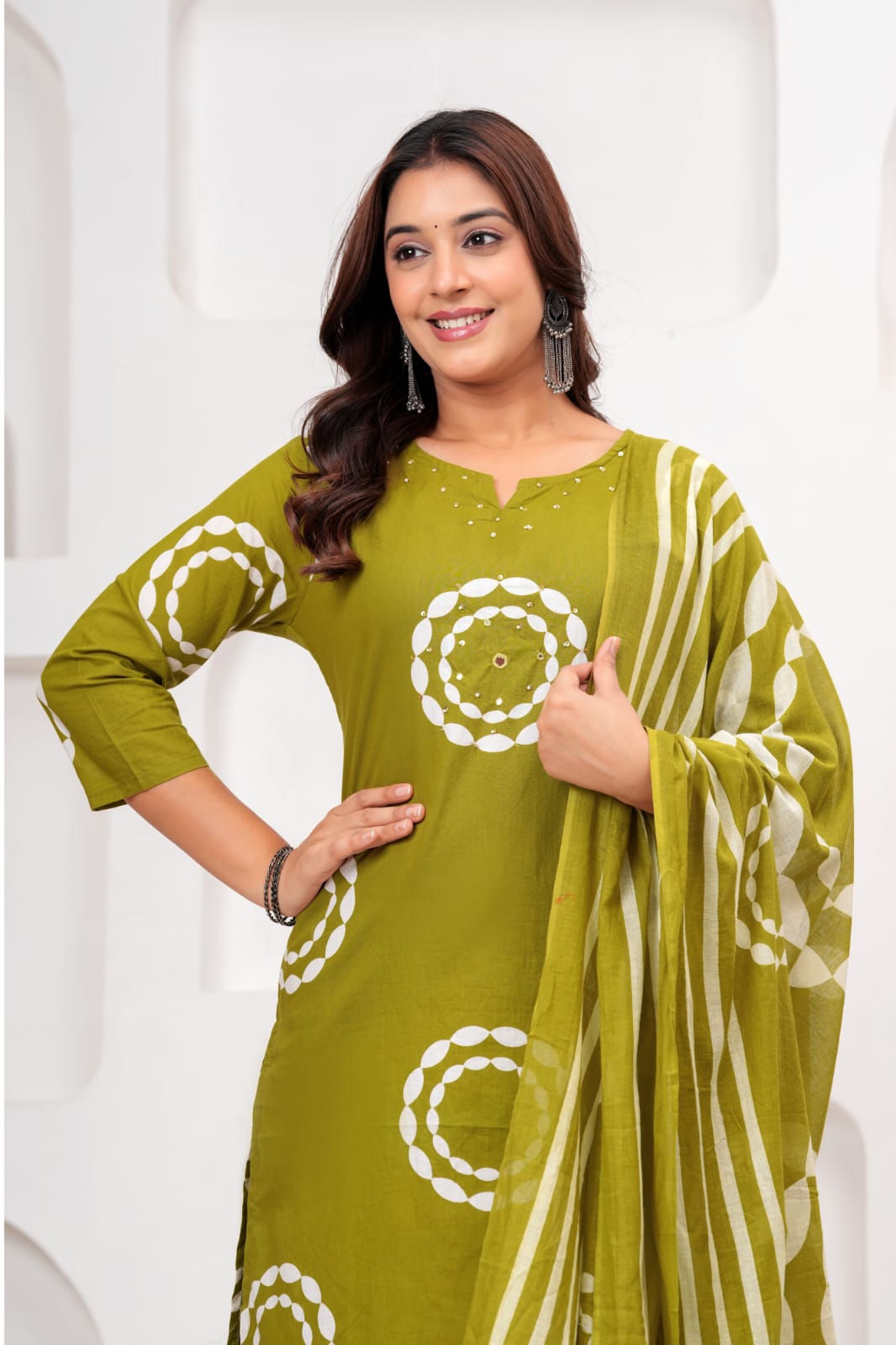 olive green cotton kurta set features white circular patterns