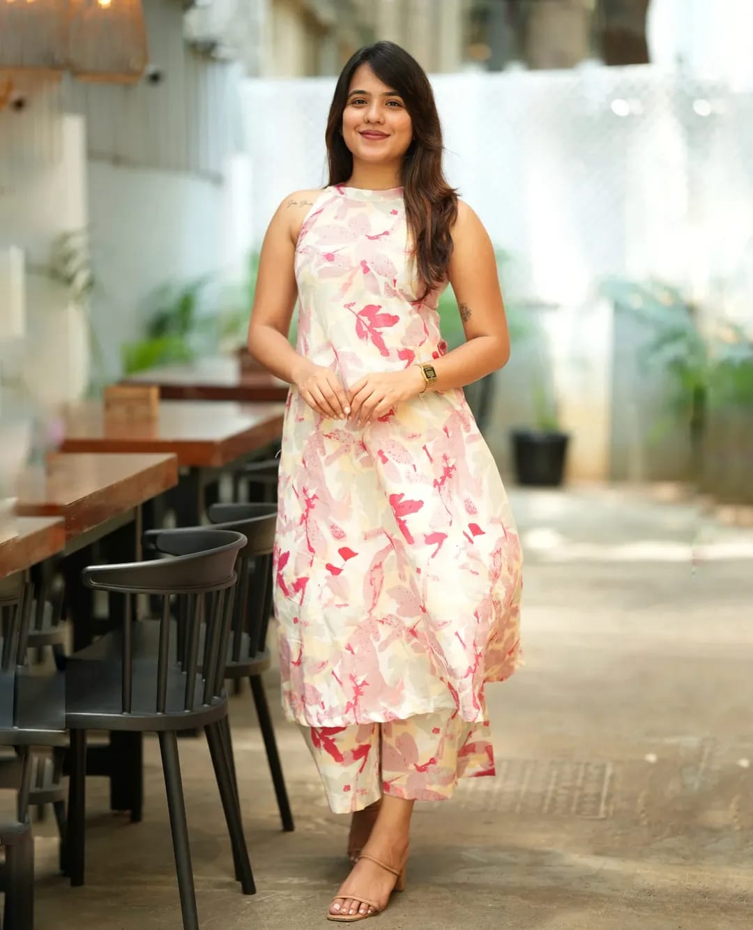 pink floral printed Kurta Palazzo set and sleeveless halter neck design