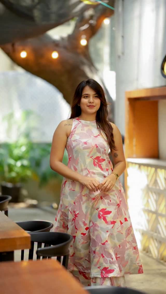 pink floral printed Kurta Palazzo set and sleeveless halter neck design
