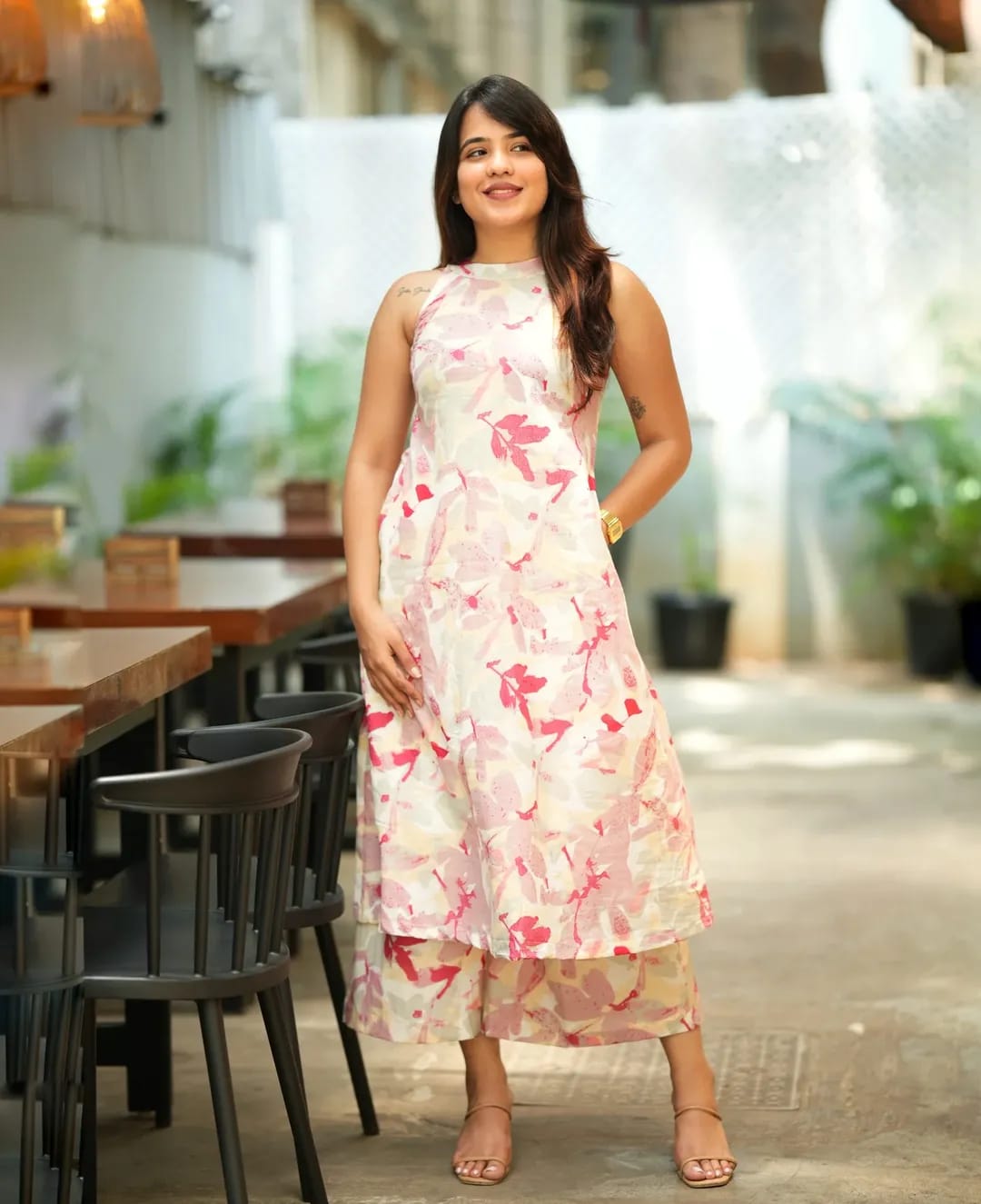 pink floral printed Kurta Palazzo set and sleeveless halter neck design